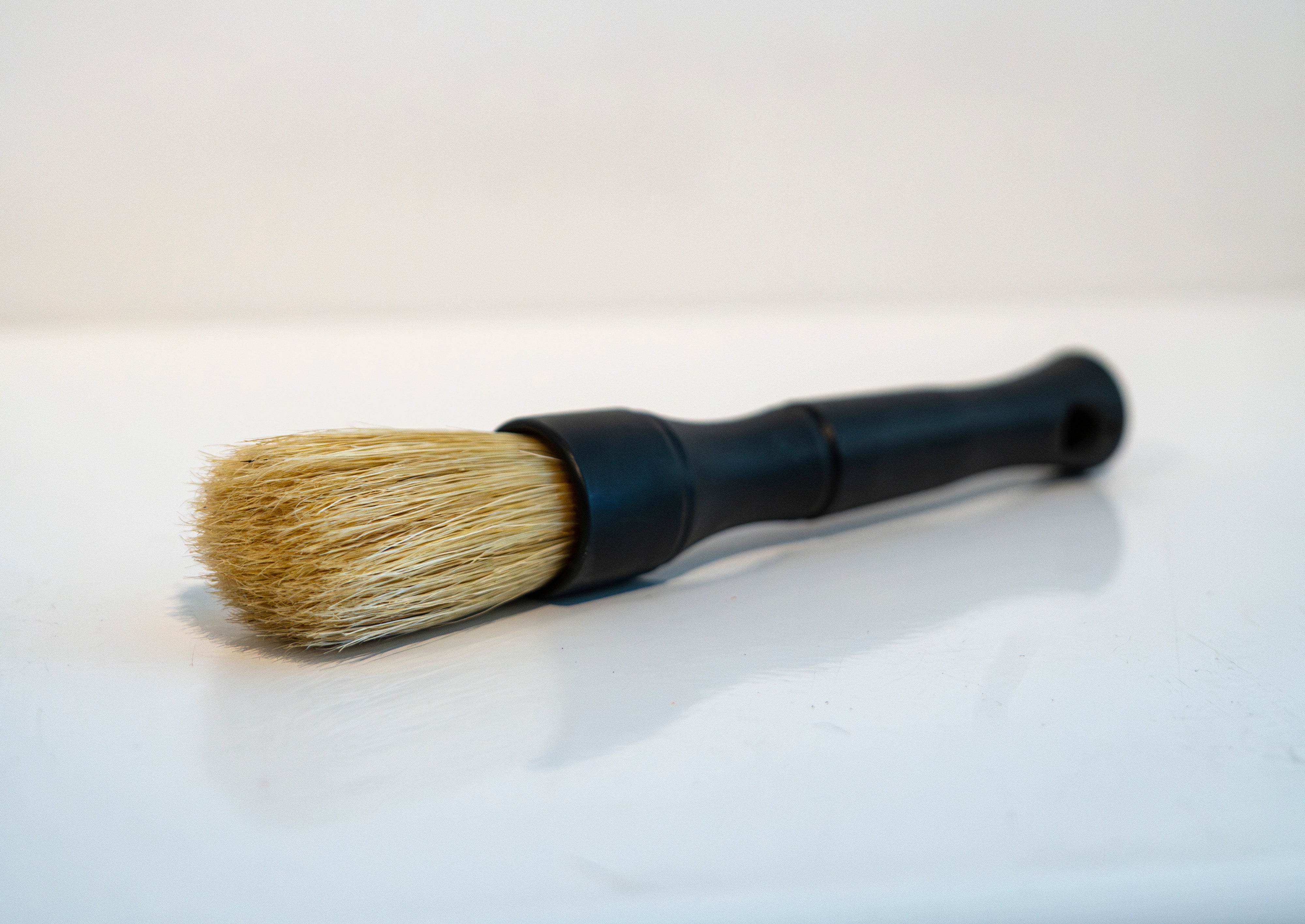 Stiff brush